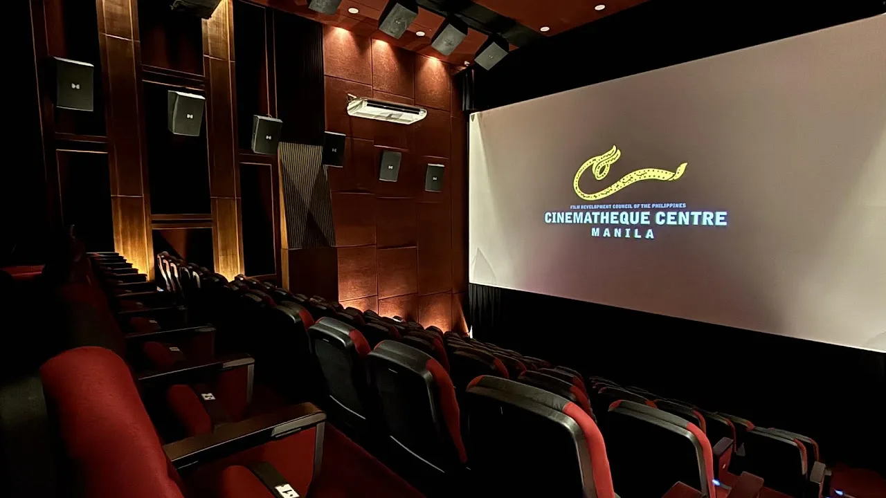 The Cinematheque Centre Manila auditorium, the centre's mark lit on the screen